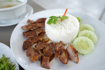 Close up Sliced barbecue pork  belly served with white rice