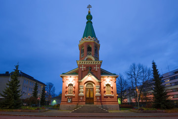 Fototapeta na wymiar Old St. Nicholas Cathedral in the October twilight. Kuopio, Finland