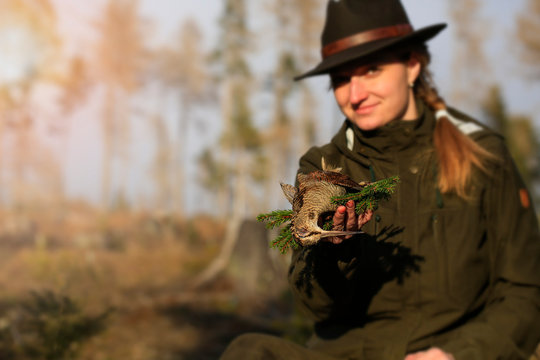 hunter in the forest,hunter woman (Scolopax rusticola)