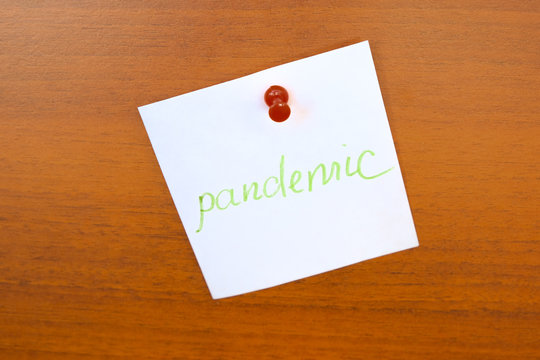 White sticker with the inscription "pandemic"