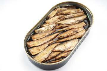 Tin with smoked sprats on a white background