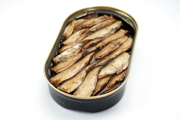 Tin with smoked sprats on a white background