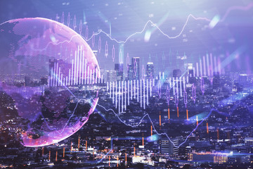 Financial graph on night city scape with tall buildings background double exposure. Analysis concept.