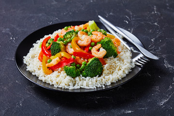 a portion of fried shrimps and veggies