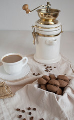 coffee cookies in a box with a cup of coffee