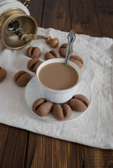 cup of coffee with coffee black cookies