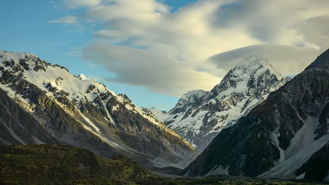 Mount Cook in the morning, fast-moving clouds and sunlight hit the mountains, creating a beautiful dimension in timelapse photography in mount cook national park , new zealand