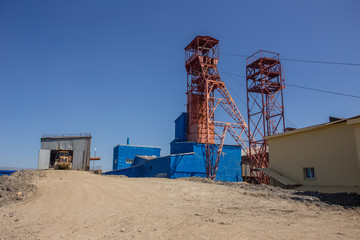 Mine headframe chrome ore mining industry with blue sky