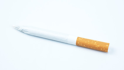 Close up of marijuana cigarettes isolated on white background, top view copy space for text..