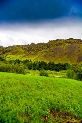Fototapeta na wymiar Beautiful Iceland highlands with moss-covered volcano formations