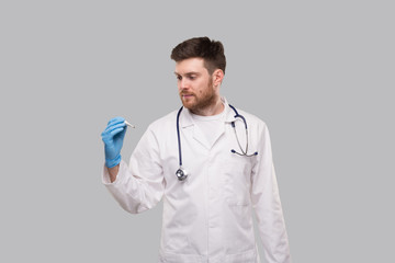 Male Doctor Wearing Gloves Watching Thermometer. Doctor with Thermometer in Hands. Healthy Life, Doctor, Virus Concept