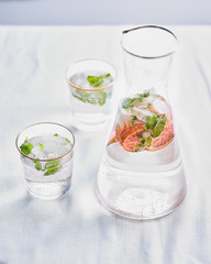 carafe of lemonade on the table