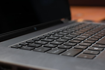 Close up macro of laptop keyboard and screen - obrazy, fototapety, plakaty