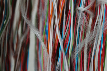 Colored wires. Closed networks of cable and wire access.