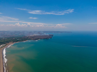 Fototapeta premium Beautiful aerial view of the city of Puntarenas and the Paseo de los turistas at the sunset in Costa Rica