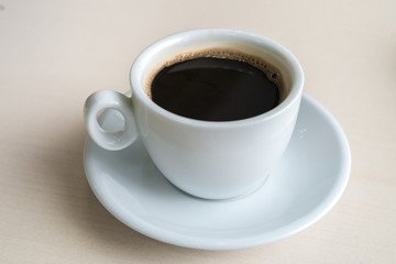 Black Coffee Cup on Table in Office