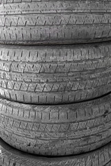 Obraz premium Pile of old tires on the ground