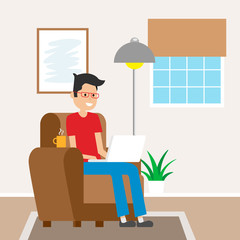 Man sitting on the sofa working with laptop. Telecommuting