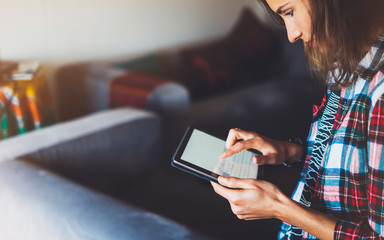 Hipster girl working tablet technology, workplace at home, isolation person holding computer with blank screen,  female hands texting mockup gadget, communication wifi internet