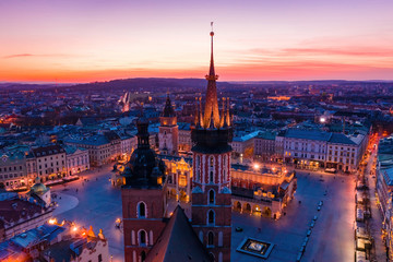 Fototapeta Basilica at Krakow old town city square at twilight drone view obraz