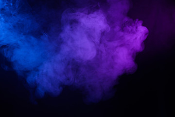 Obraz na płótnie Canvas Smoke cloud pink and blue abstract dark background