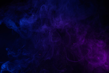 Abstract blue and pink fog with shiny particles dark  background
