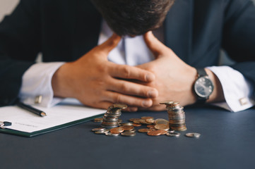 Depressed businessman lost his business. Destroyed businessman. Concept of business loss, bankruptcy and crisis.
