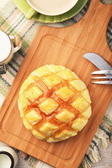  Pineapple bun on wooden table