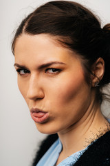 Naklejka premium girl shows tongue