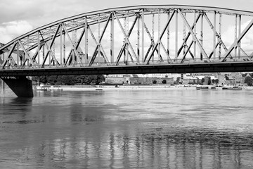Metal bridge in Torun. Black and white retro style.