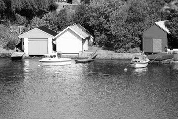 Fototapeta premium Bergen, Norway - boat garages. Black and white retro style.