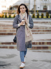 Woman portrait walking in the street