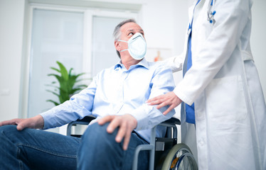 Disabled man wearing a mask during coronavirus pandemic