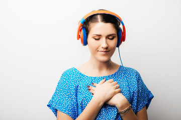 girl listening to music on headphones