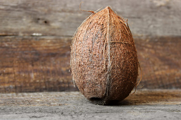 Coconut on a wooden background. Coconut close up