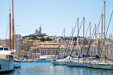 Aerial panoramic view on basilica of Notre Dame de la Garde and old port in Marseille, France....