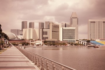 Fototapeta na wymiar Singapore city skyline. Retro filtered color style.