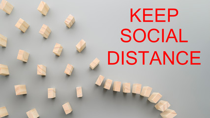 Stop 2019-nCov. Keep social distance to stop the domino effect. Preventive measures to combat the global spread of the pandemic coronavirus. Horizontal orientation.