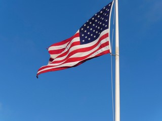 American Flag on Blue Sky