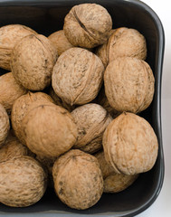 fresh walnuts, superfood, healthy foods, nuts on a wooden surface, close-up