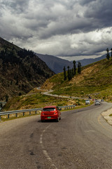 Red Car on the road 