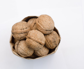 fresh walnuts, superfood, healthy foods, nuts on a wooden surface, close-up
