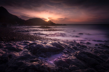 Daybreak over Bracelet Bay on the Gower peninsula in Swansea, South Wales, UK