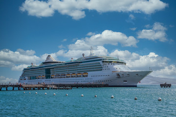 Cruies Ship Disembarking Passengers in Sunny Port