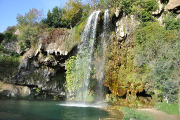 SALLES LA SOURCE, AVEYRON, OCCITANIA, FRANCE, EUROPE, AUTUMN 2018. Salles la Source waterfall.
