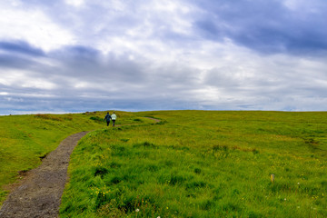 Icelandic family walking on the coast