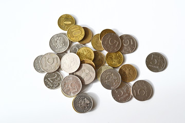 A coin costs two rubles, five rubles, ten ruble coins on a white background