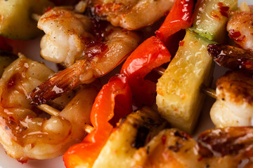  Fried King Prawns Served in Plate, closeup on black background