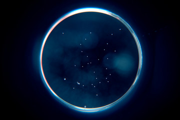 Abstract background with a black hole. Sphere on black background.