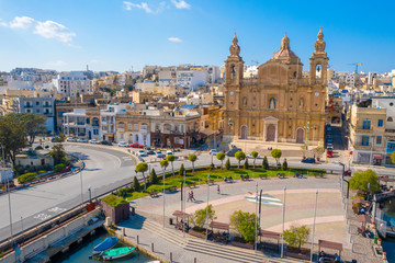 Fototapeta premium Aerial view of Msida marina bay and church. Sunny day. Malta island
